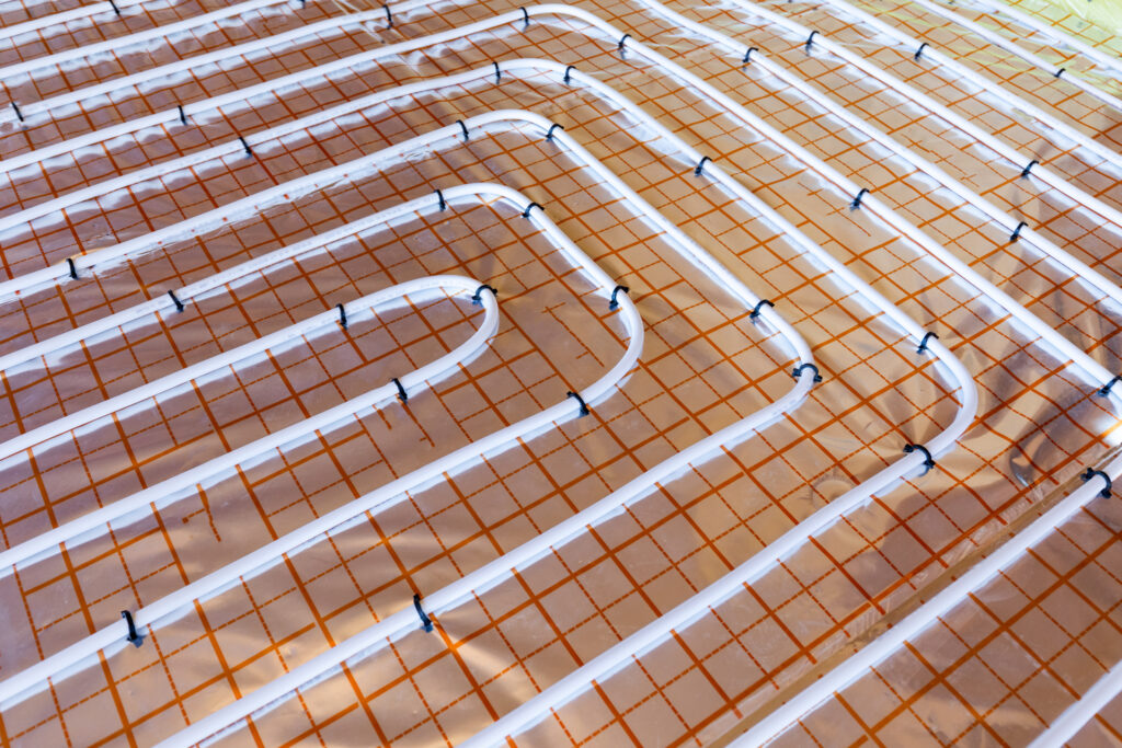Underfloor heating system installed in house under construction