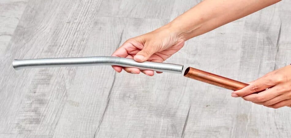 insert the pipe or spring